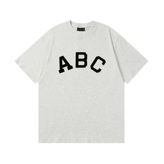 FEAR OF GOD Kaos lengan pendek original merek streetwear fashion dengan model super oversized (sangat longgar).FG-9702